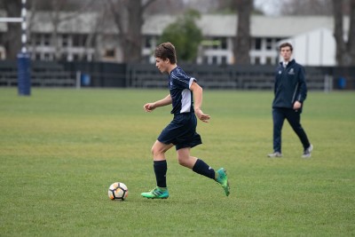 Student playing football