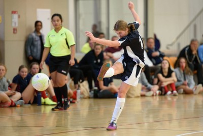 Student playing futsal