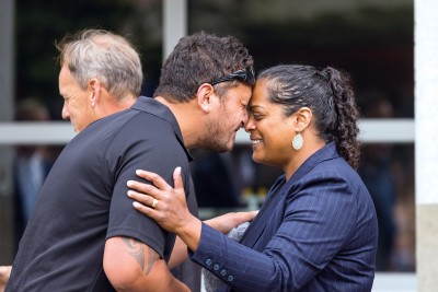 Staff members welcoming one another during the Mihi Whakatau.